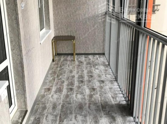 Отделка лоджии - керамическая плитка и ПВХ панели