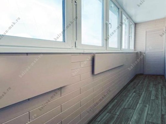 Остекление лоджии. Цена с отделкой натуральным деревом