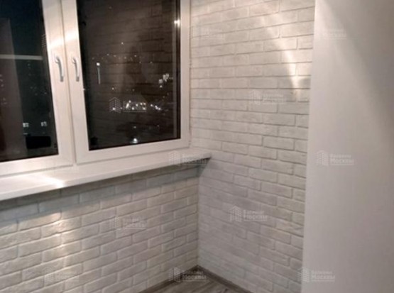 Утепление лоджии с отделкой декоративными кирпичиками