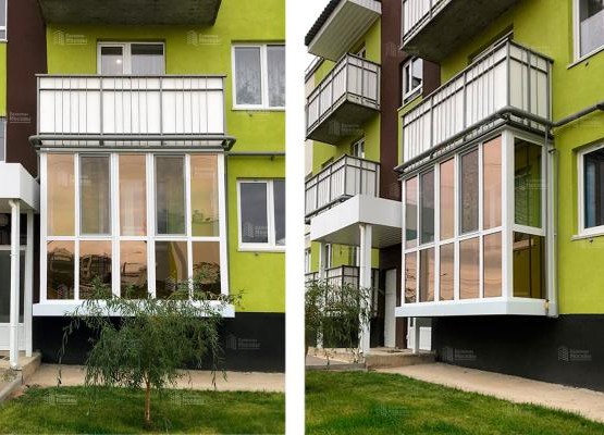 Остекление балкона с панорамным видом, зеркальной тонировкой и энергосберегающими стеклопакетами