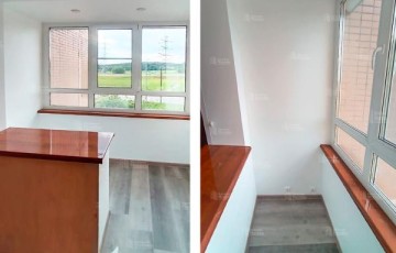 Европейский стандарт: теплое остекление и лаконичная отделка лоджии