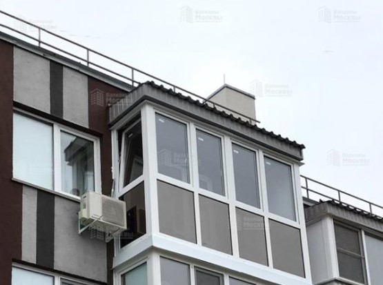 Теплое панорамное остекление балкона с тонировкой