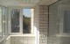 Остекление балкона 3,2х1,0 м с отделкой декоративной плиткой 