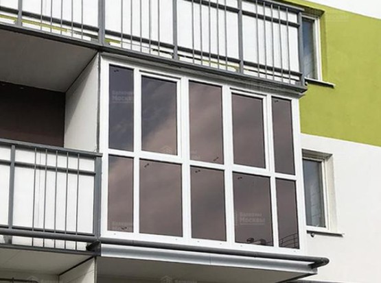 Остекление с тонировкой: Французский балкон с видом на город