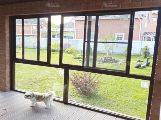 Остекление террасы раздвижными конструкциями